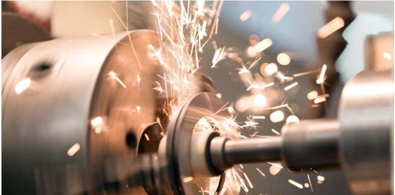 Precision grinding operation with cutting sparks