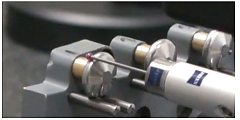 Precision dimensional inspection of a machined part