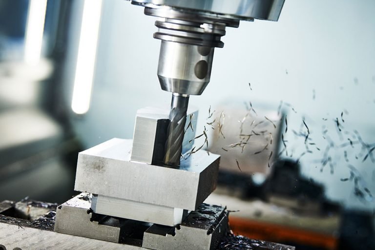CNC milling operation cutting aluminum stock