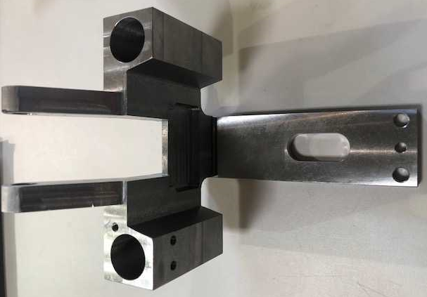 Pivot arm fixture component